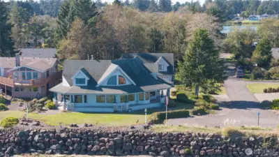 WELCOME TO THIS SPACIOUS 3 BEDROOM 1.75 BATH HOME HIGH AND DRY ABOVE THE BULKHEAD! THE HOME BOASTS SIX GARAGES WITH A 1 BEDROOM 3/4 BATH APARTMENT ABOVE ONE GARAGE AND A FULL RECREATION ROOM ABOVE THE OTHER!