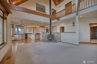 THE MATCHING HARDWOOD FLOORING AND ACCENT WOODS MAKE THIS A FOCAL POING FOR GATHERINGS!
