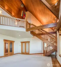 THE HARDWOOD STAIRWAY AND CEILING ARE A FOCAL POINT OF THE LIVING AREA UP TO THE OTHER BEDROOMS!