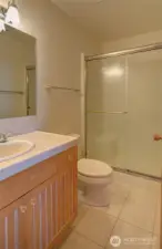 AT THE TOP OF THE STAIRS IS A 3/4 BATH WITH STEP-IN SHOWER FOR GUESTS!