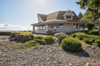 CAPTAIN GREY CT VIEW OF THE HOME SHOWING THE LANDSCAPING AND BAY IN THE BACKGROUND!
