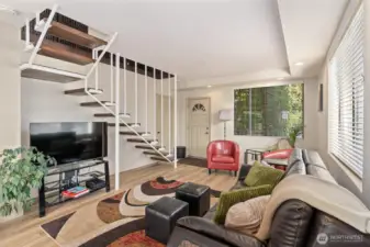 Interior stairs in unit #2 lead to top floor"penthouse" feel with outstanding views.