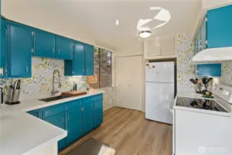 The kitchen has 2 separate pantry spaces  for plenty of storage.