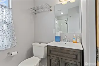 Top floor bathroom with updated shower.