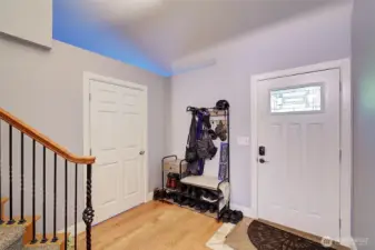 Entry with hardwood flooring