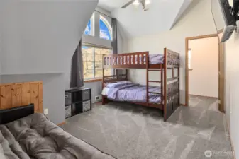 Upper bedroom - There are 2 bedrooms, a full bath and an loft on the second level.