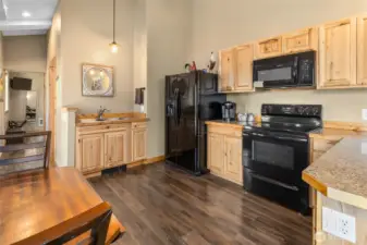 Full kitchen and eating area