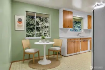 Breakfast nook off the kitchen. Virtually staged.