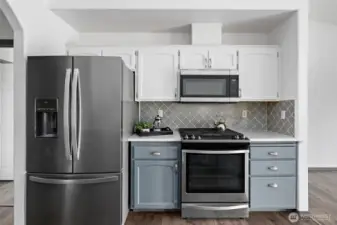Stainless steel appliances and gas stove.