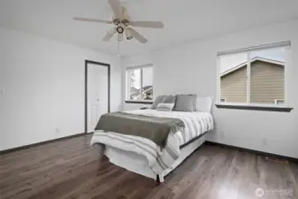 Spacious and light filled primary bedroom.