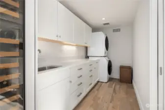 The kitchenette, perfect for entertainment and a second laundry room.