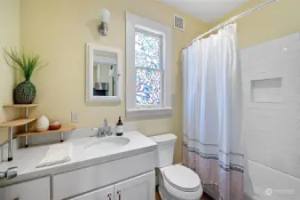 The generously sized, full bathroom on the mail floor has been updated and has a newer vanity and shower/tub insert.