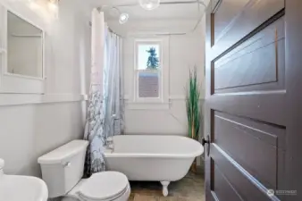 Upstairs, you will find another full bathroom with an original claw foot bathtub!