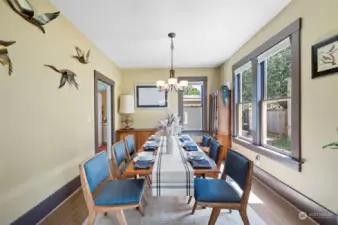 The light-filled dining space right off the kitchen and living room helps give the main floor an ideal flow for easy living and entertaining. The