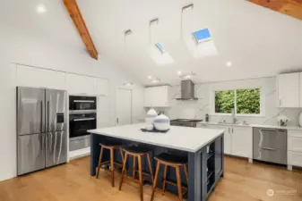 Kitchen includes Miele appliances and generous island space.