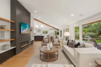 Spacious living room space with contemporary  notes and abundant custom built-ins.