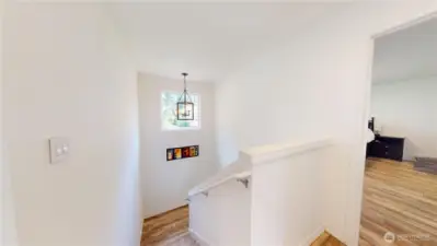 Stairs looking down towards the first level of the home