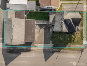 Aerial View – Corner Lot with Home, Shop, and Expansive Wrap-Around Yard