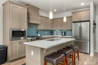 Enjoy this gorgeous kitchen and cooking on your high end appliances.