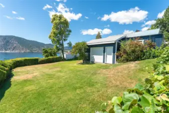 This detached garage provides approx. 320 sq ft of added storage — perfect for keeping your outdoor gear, gardening tools, or seasonal items secure and out of sight