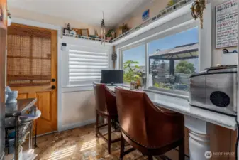 A handy kitchen-side nook provides flexible space for organizing pantry essentials, managing daily clutter in a mudroom, or setting up a quiet workspace
