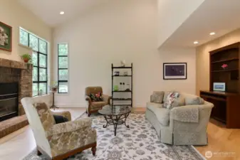 Living room is bright and cheerful with large winddows to bring the outside in!