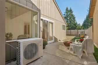 Another view of the patio area. Also shown is the ductless heat pump.
