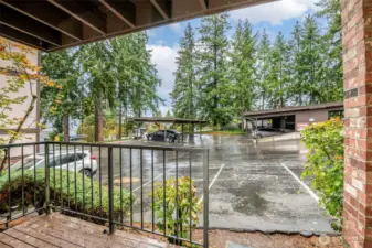 View of assigned carport just of deck.
