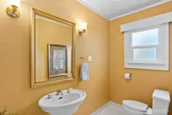 Large 1/2 bathroom on the main level tucked away from the main living areas.