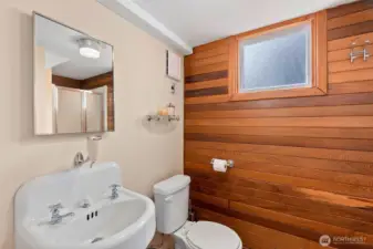 The lower level features a 3/4 bathroom right off the spacious laundry and mudroom.