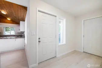 enter into large foyer with closet