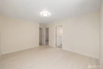 Bonus space sits between the kitchen and living room and the bedrooms. So many possibilities for this space...office, play space, game room?