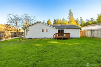 Deck is located off the master bedroom. Yard could be totally enclosed quite easily.