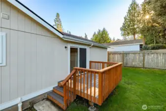 Deck off master bedroom has low-maintenance composite decking.