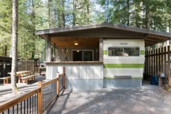 Well maintained and thought out lot design. Fully fenced area, darling additional sleeping cabin and so much more! No detail spared!