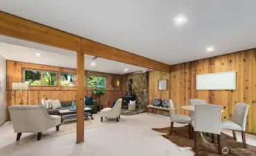 Super cute real knotty pine rec room is expansive.
