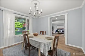 Formal dining room - has a breezeway connecting to the kitchen.