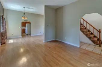 Bright and open main level with seamless flow from living to dining to kitchen—ideal for comfortable living and entertaining.
