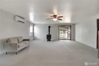 Living area as you enter the front door. Hall to kitchen and bedrooms on the right.