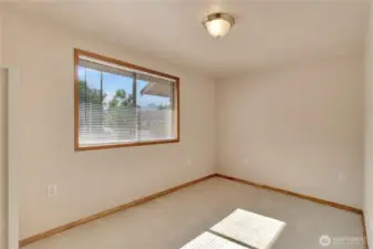 down the hall, this is the first bedroom!