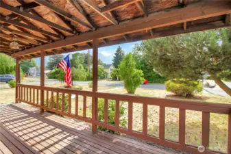 Front deck space with views of the front yard and partial mountain views.