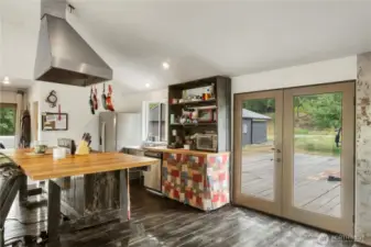 Colorful, creative, and full of character—this kitchen blends artisan finishes with everyday function.