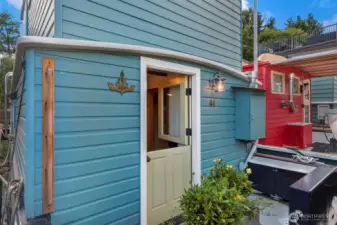 The dutch door welcomes you home to this happy home.