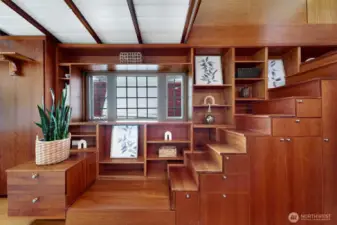Stairs leading to the bedroom and upper deck.