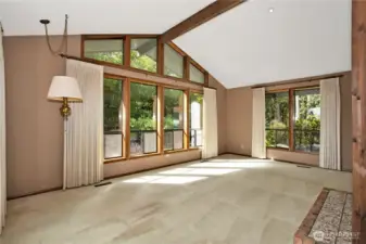 Living room with wood burning fireplace