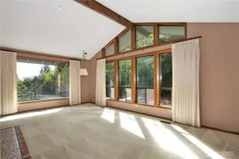 Another view of living room, with big picture window that looks out towards the back portion of the property.