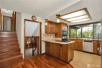 Kitchen has brand new stove top, granite counters, newer appliances with windows to take in wildlife and territorial views.