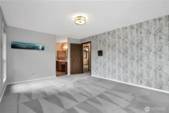 Another view of primary with primary bathroom & walk-in closet