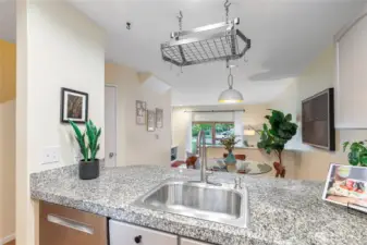 Cook and converse, as the kithen opens to dining and lower living areas