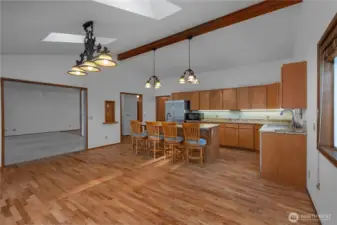 Another view of the kitchen with the living room to the left.